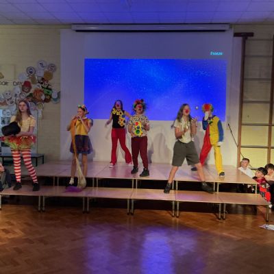 Children rehearsing for their play